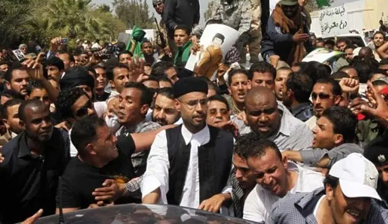 গাদ্দাফি পুত্রের শেষ বিদায়ে হাজারো মানুষের ঢল